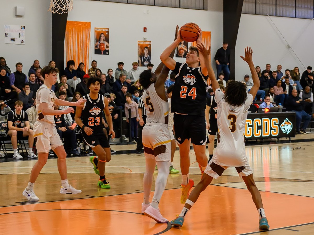 Greenwich Country Day School edges neighborhood basketball rival Brunswick School in overtime thriller, 69-65