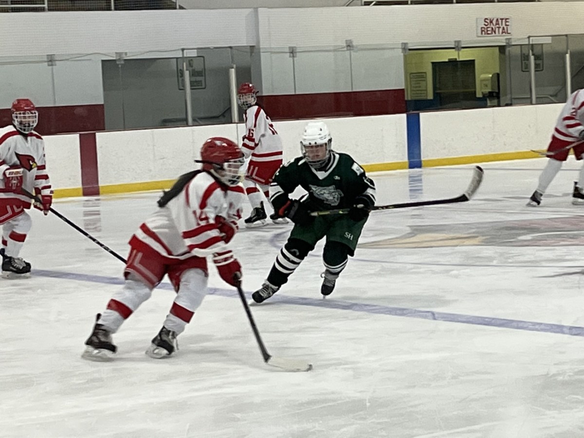 Greenwich High School girls ice hockey team victorious against neighborhood opponent Sacred Heart Greenwich