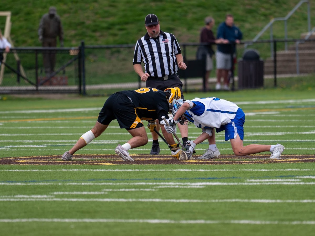 Brunswick lacrosse team tops rival Darien at Cosby Field; Aidan Diaz-Matos perfect on faceoffs for victorious Bruins