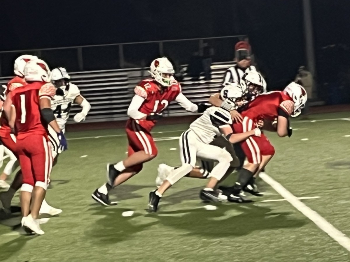 Greenwich High football team upends Staples in CIAC Class LL Tournament quarterfinals, 41-7; Cardinals face Fairfield Prep in the state semifinals