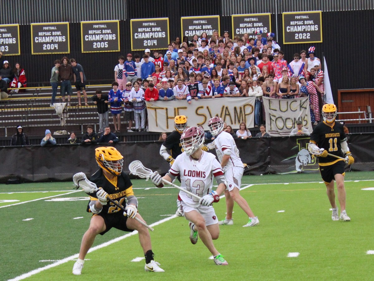 Brunswick School varsity lacrosse team edged by rival Loomis Chaffee School