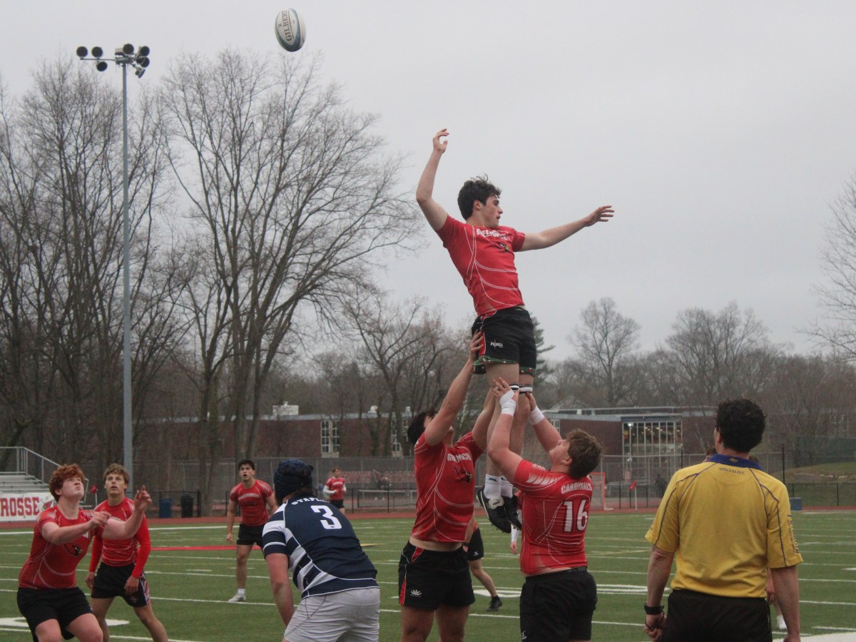 Greenwich High varsity boys rugby team overpowers state rival Staples, 68-8