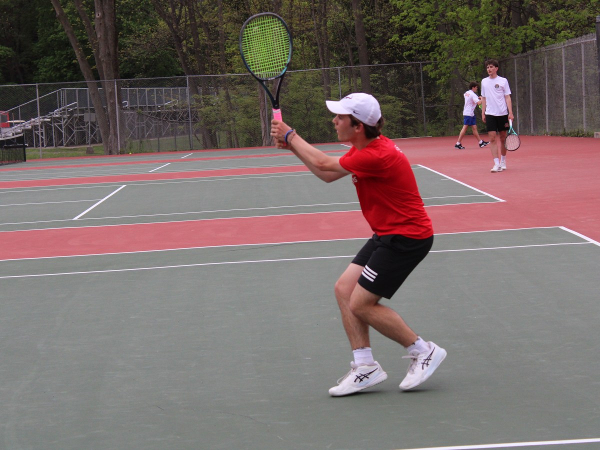 Greenwich High School varsity boys tennis team tops Ridgefield in key FCIAC match for 10th victory of the season
