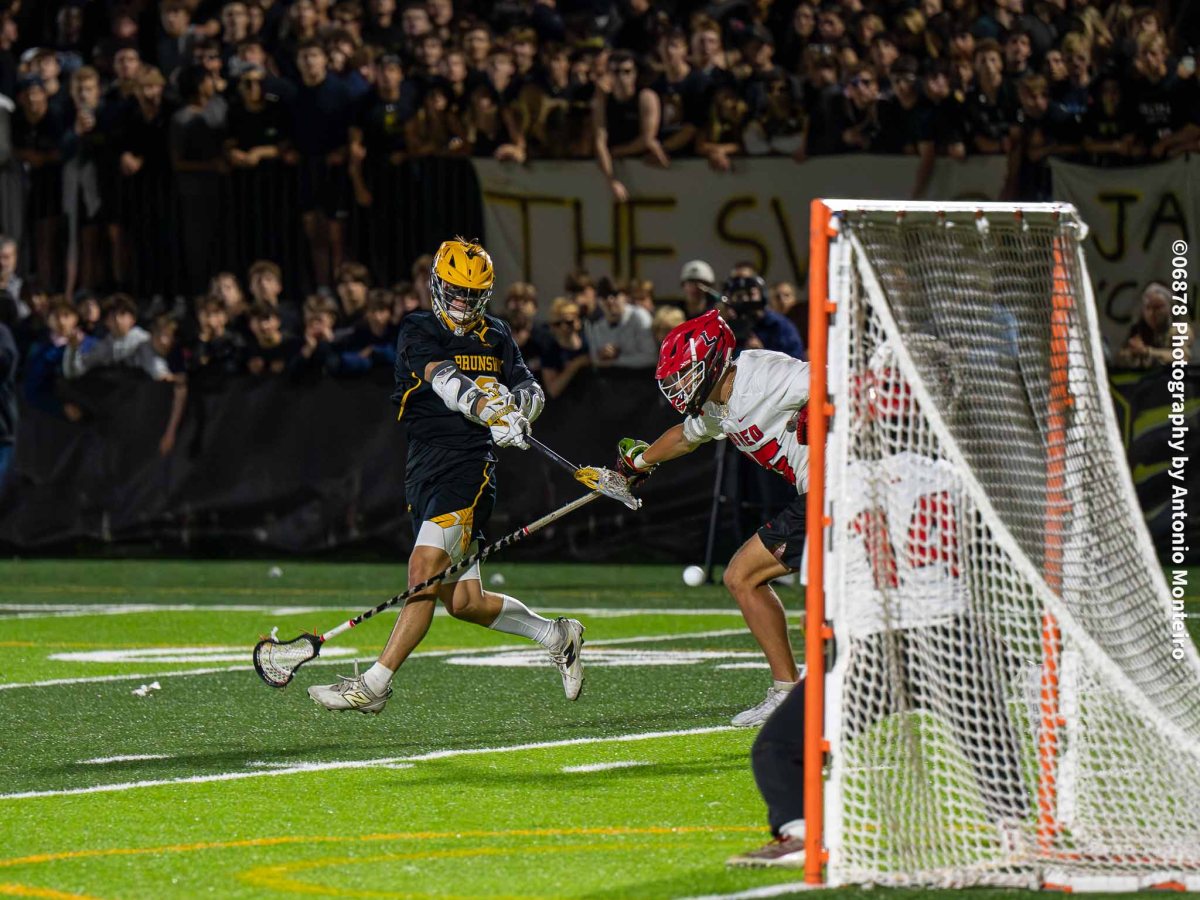 Brunswick School varsity lacrosse team wins thriller over Lawrenceville School in double OT in Prep Nationals Tournament semifinals on Lucas Garcia’s goal