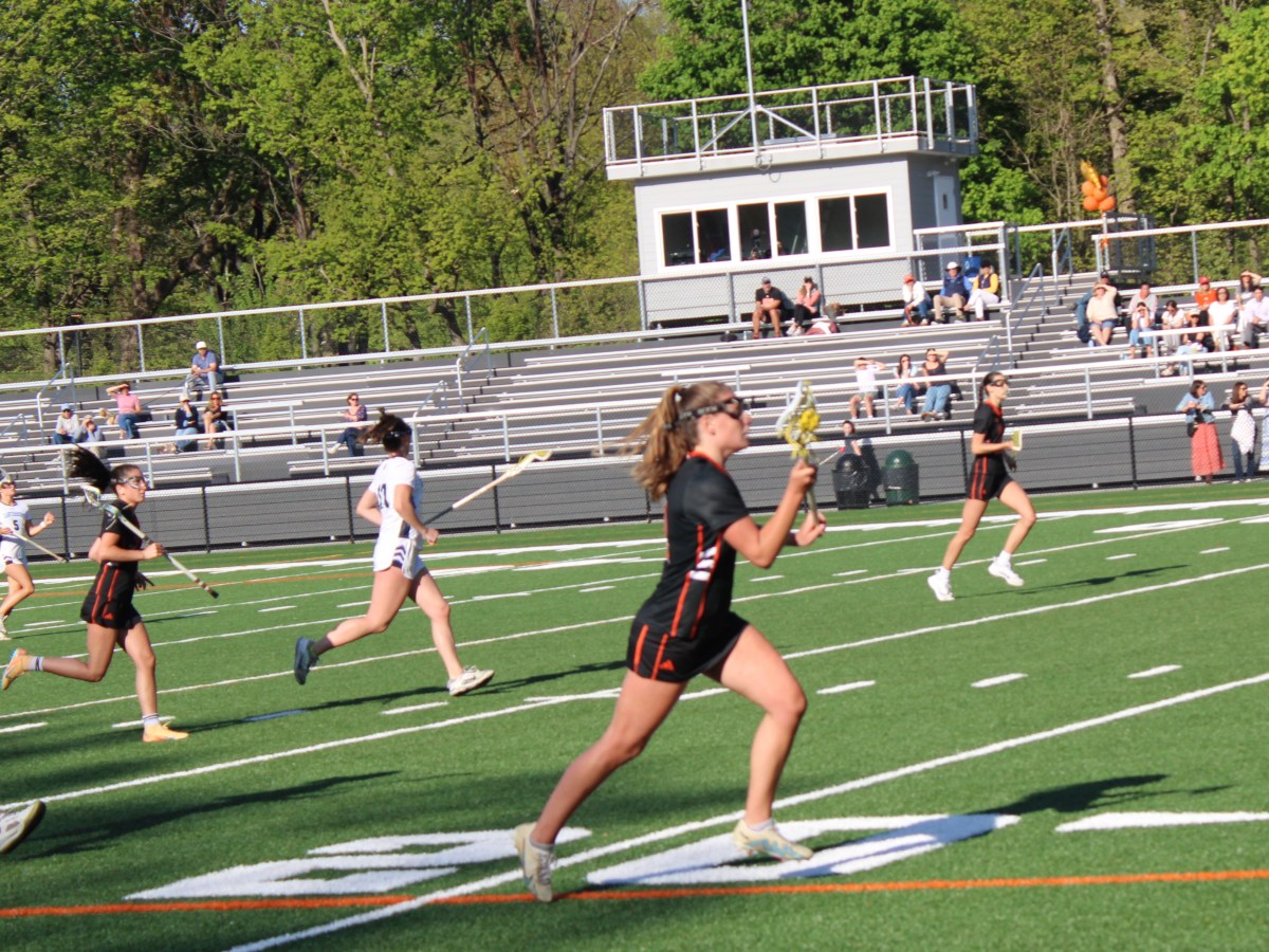 Greenwich Country Day varsity girls lacrosse team celebrates Senior Day with a decisive victory over Canterbury School; Tigers also victorious vs. Rye Country Day